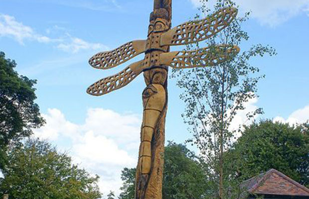 A dragonfly totem pole